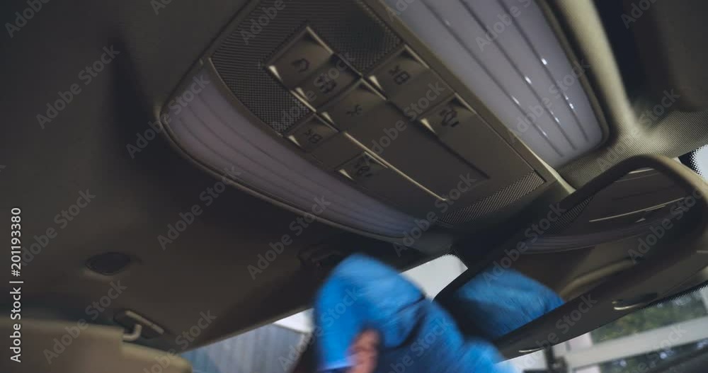 Dry cleaning of the car panel, a rag, pink rubber gloves, car washing. Dry cleaning of the car panel, a rag, pink rubber gloves, car washing.