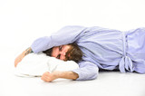 Man with sleepy face lies on pillow. Hipster with beard