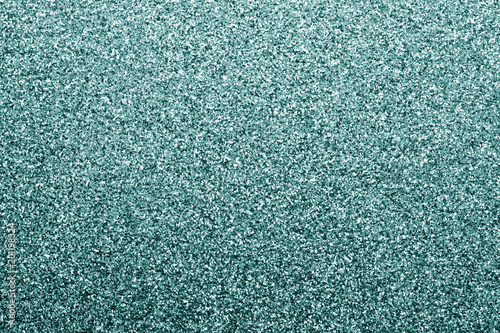 Glittering background in cyan tone.