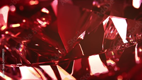 Close-up of slowly rotating red diamond. Seamless loop, nice looping background photo