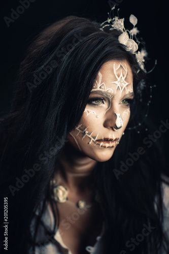 Girl with a stylized make-up of a dead bride © liyasov