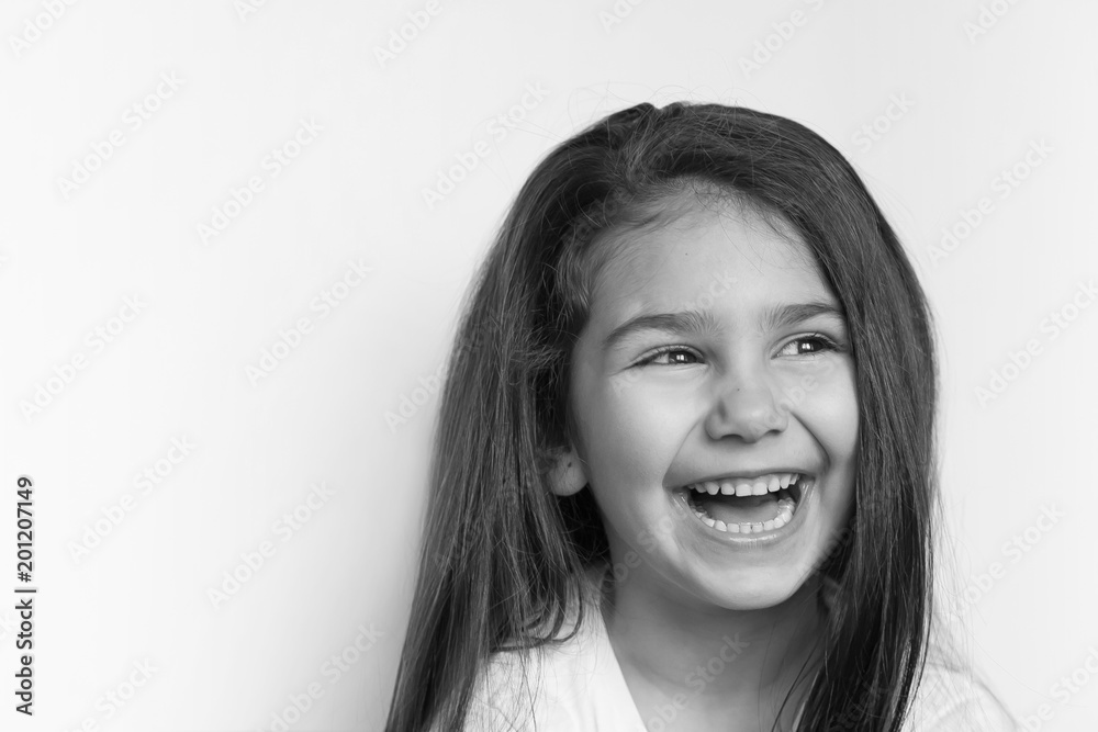 Portrait of happy child girl. Black and white portrait. Portrait of happy child girl. Black and white portrait.