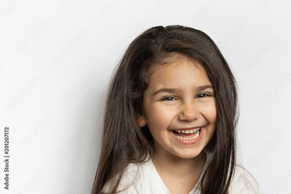Portrait of happy cute brunette child girl with long hear. Portrait of happy cute brunette child girl with long hear.