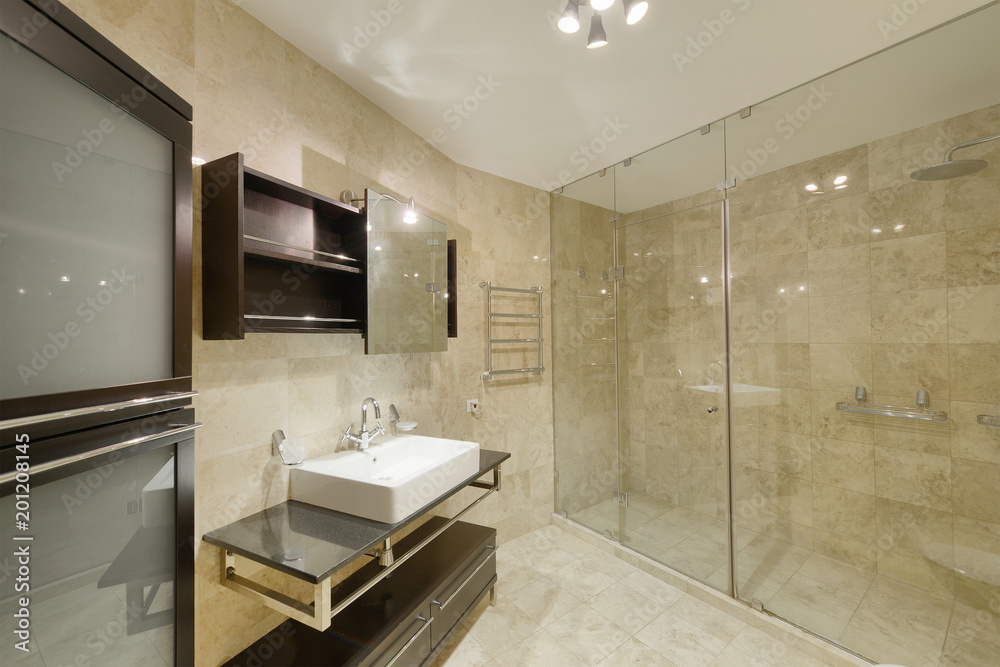 Modern interior of the bathroom in the new house. Modern interior of the bathroom in the new house.