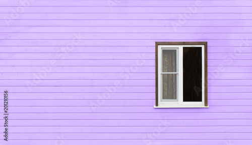 One rustic window on the ultra violet wall. Pattern.