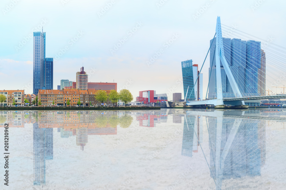 Naklejka premium Erasmus bridge across new meuse, luxor theatre, headquaters of KPN, Montevideo, port center of Rotterdam