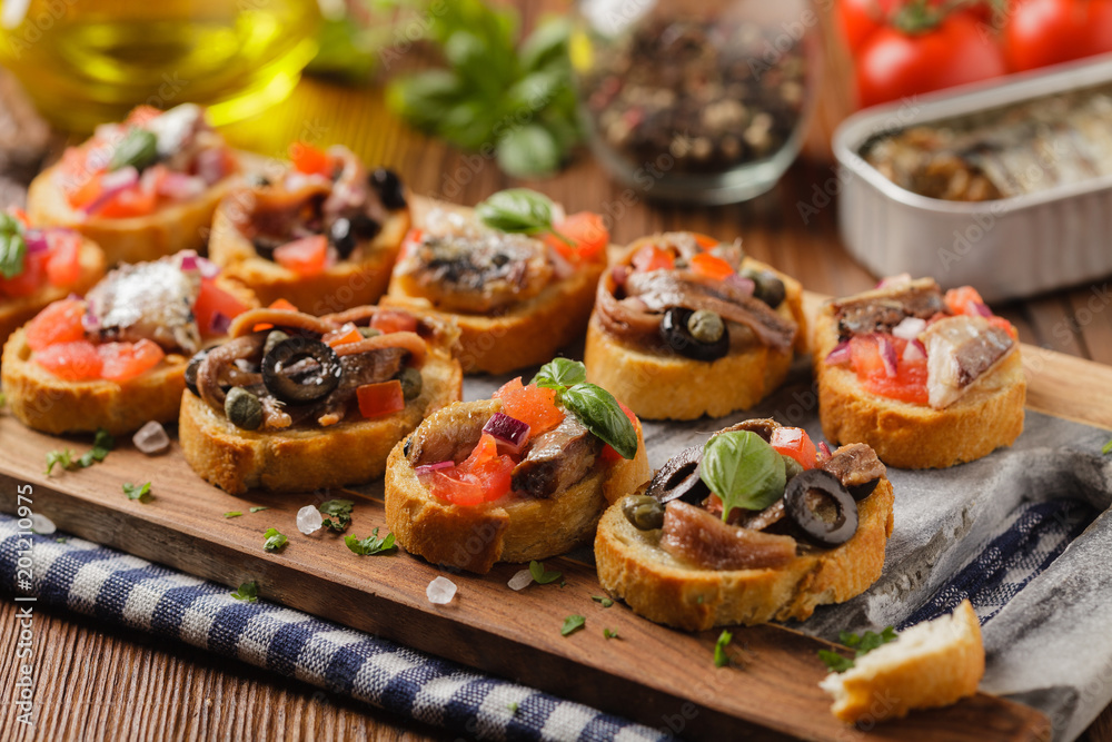 Mix Bruschetta with sardines and anchovies. Mix Bruschetta with sardines and anchovies.