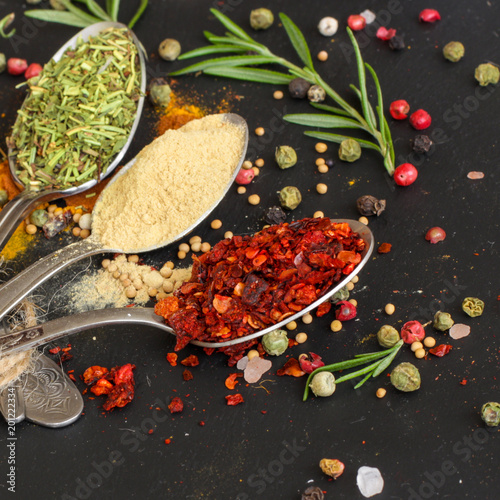 Spices and herbs. Variety, herbs on a wooden surface. Food background