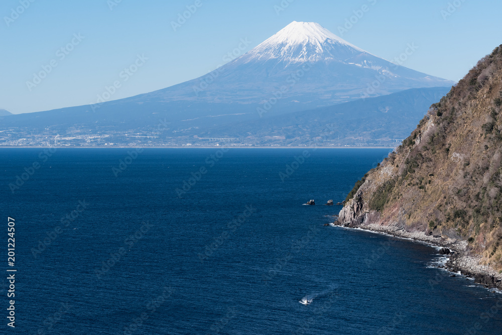 The Mt. Fuji and Sea of Suruga bay at Ida area in Spring Season. The Mt. Fuji and Sea of Suruga bay at Ida area in Spring Season.