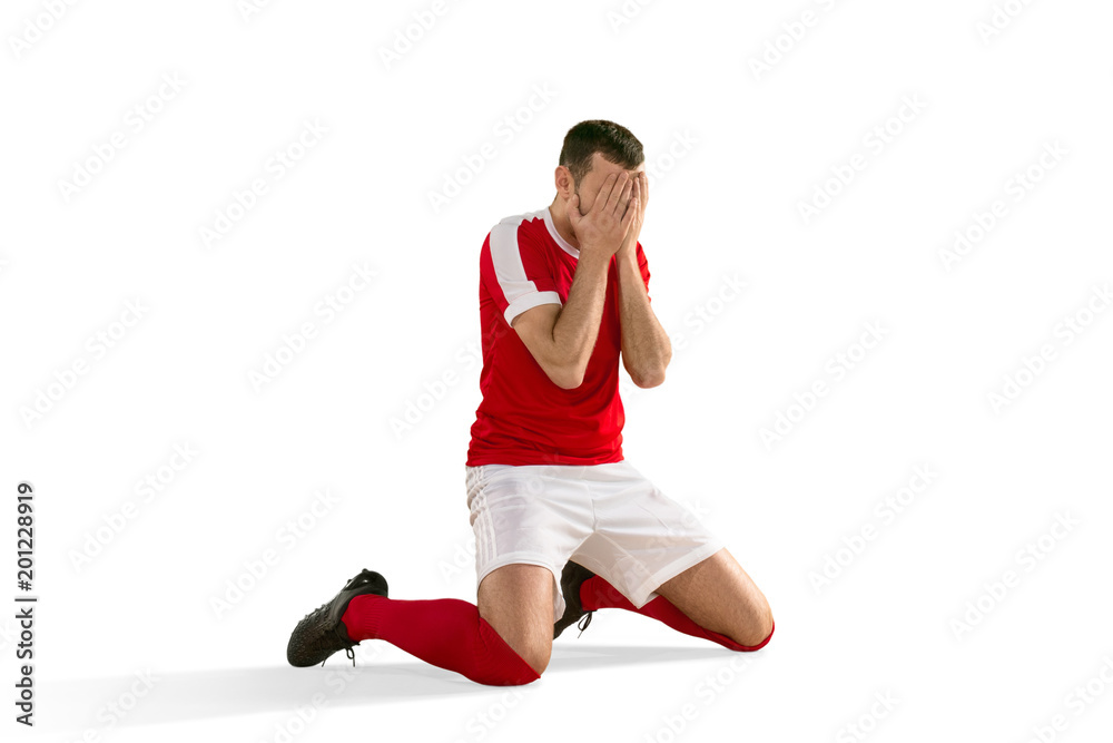 unhappy soccer or football player with palm on his face