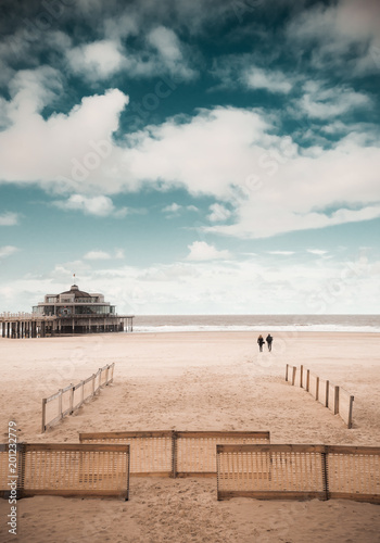 Walk on the beach to the palace pier at Blankberg (Belgium) on the fascinating north sea