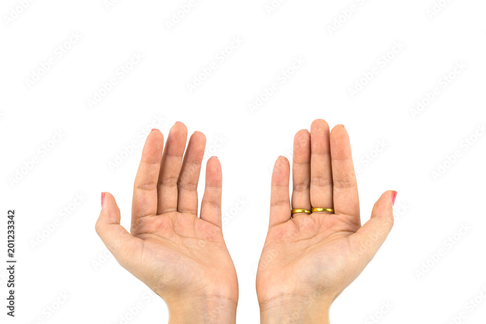Outstretched cupped hands of young woman with two gold ring isolated Outstretched cupped hands of young woman with two gold ring isolated