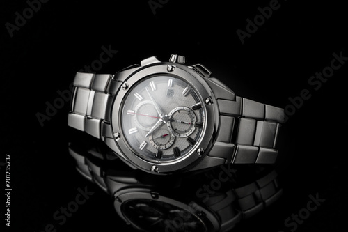 Luxury watch isolated on a black background with reflection. High quality. Highclass.