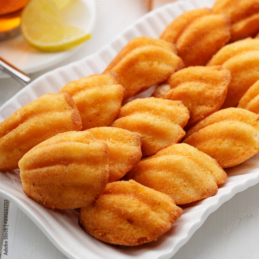 Madeleine - homemade traditional French small cookie. Madeleine - homemade traditional French small cookie.