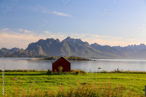 On along the road in the evening sun in Northern Norway photo