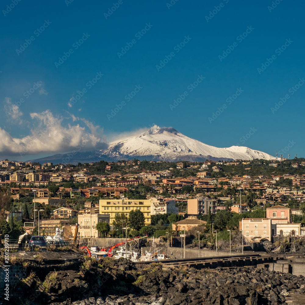 12-28-2016. Catania, Sicily, Italy. The Etna volcano viewed from Ognina.