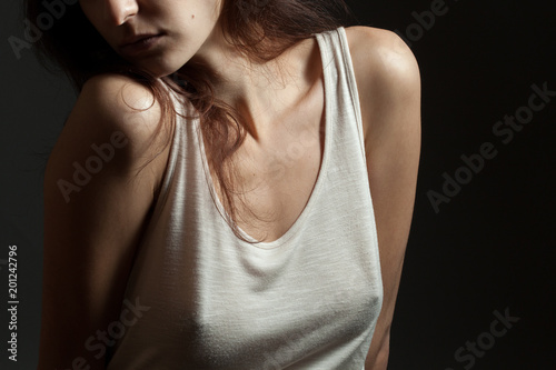 Young woman in shirt. Studio photo