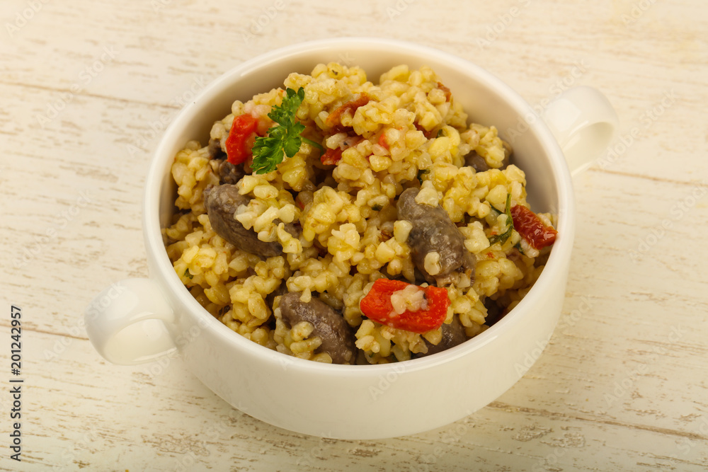 Bulgur with chicken hearts
