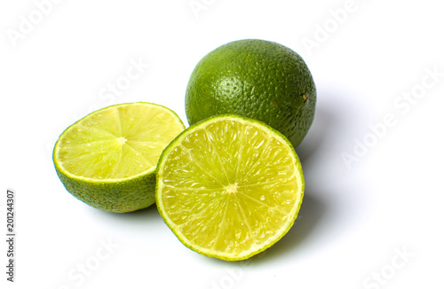 Green lime fruit isolated on white
