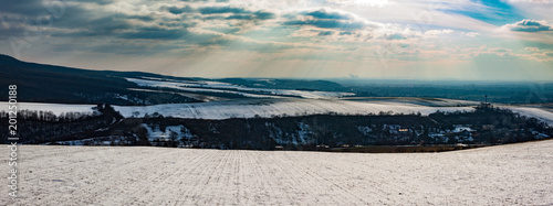 Beautiful panorama landscape of frozen slovak country in hidden in snow