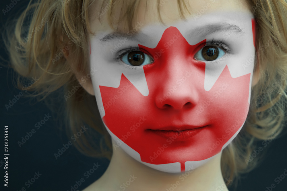 Child with a painted flag of Canada Child with a painted flag of Canada