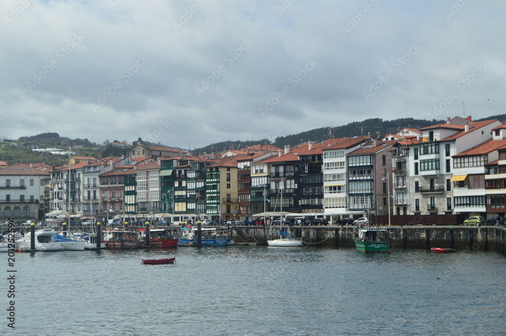Beautiful Shot Of The Wooden Buildings Of The Port District On The Bay Taken From The Lonja De Lekeitio. March 24, 2018. Architecture Nature Landscapes. Lekeitio Vizcaya Basque Country Spain.