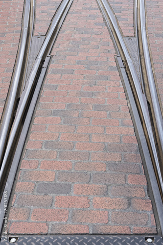 Tram rails in a brick street