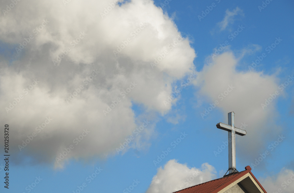Cross on top of church, with sky and clouds behind. Good for use as background. Cross on top of church, with sky and clouds behind. Good for use as background.