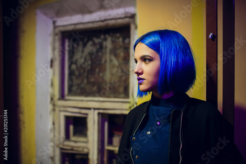 Portrait beautiful girl with blue hair photo
