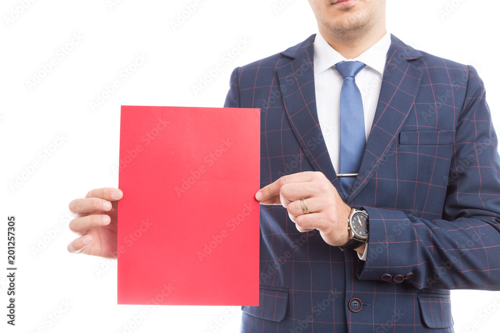 Close-up of businessman holding empty sheet. Close-up of businessman holding empty sheet.