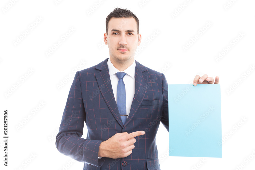 Handsome marketing manager holding empty paper. Handsome marketing manager holding empty paper.