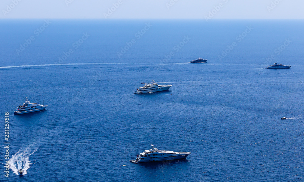 Blue sea and leisure boats seen from  from Augustus Gardens,Isle of Capri, Italy