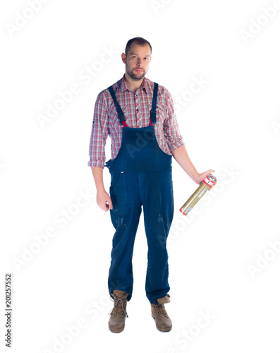 Portrait of a young worker standing on white background photo