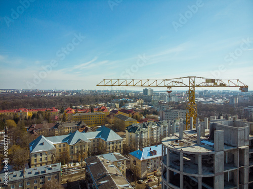 birds eye view on contraction site with crane