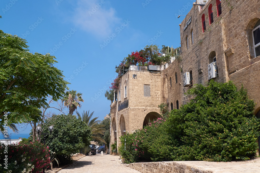 Scenic view of the street with ancient building on the coast of Mediterranean Sea. Tel Aviv-Jaffa, Israel