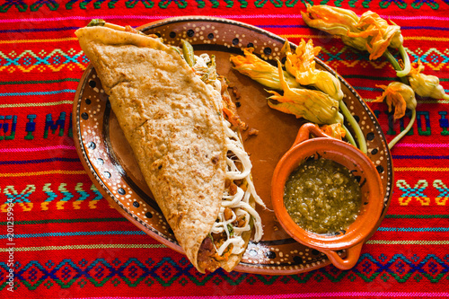 mexican quesadillas with squash blossom, cheese and sauce in mexico photo