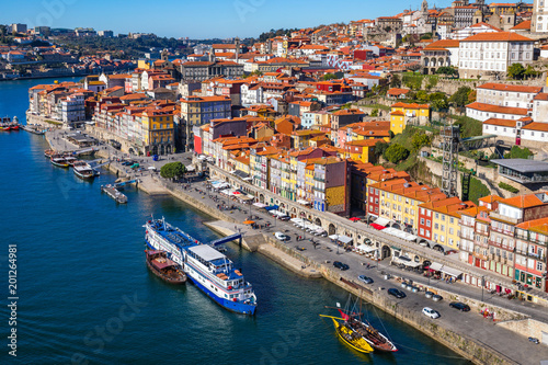 Fototapeta Naklejka Na Ścianę i Meble -  Panoramic view of Old city of Porto (Oporto) and Ribeira over Douro river, Portugal. Concept of world travel, sightseeing and tourism.
