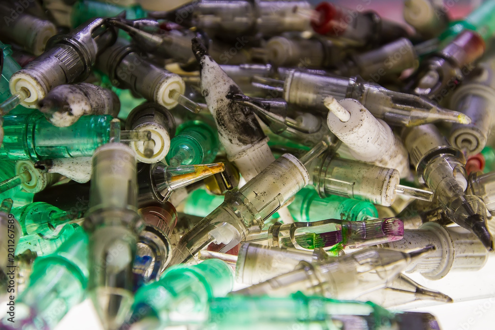 a large number of used with traces of paint cartridges for tattoo machines. a large number of used with traces of paint cartridges for tattoo machines.
