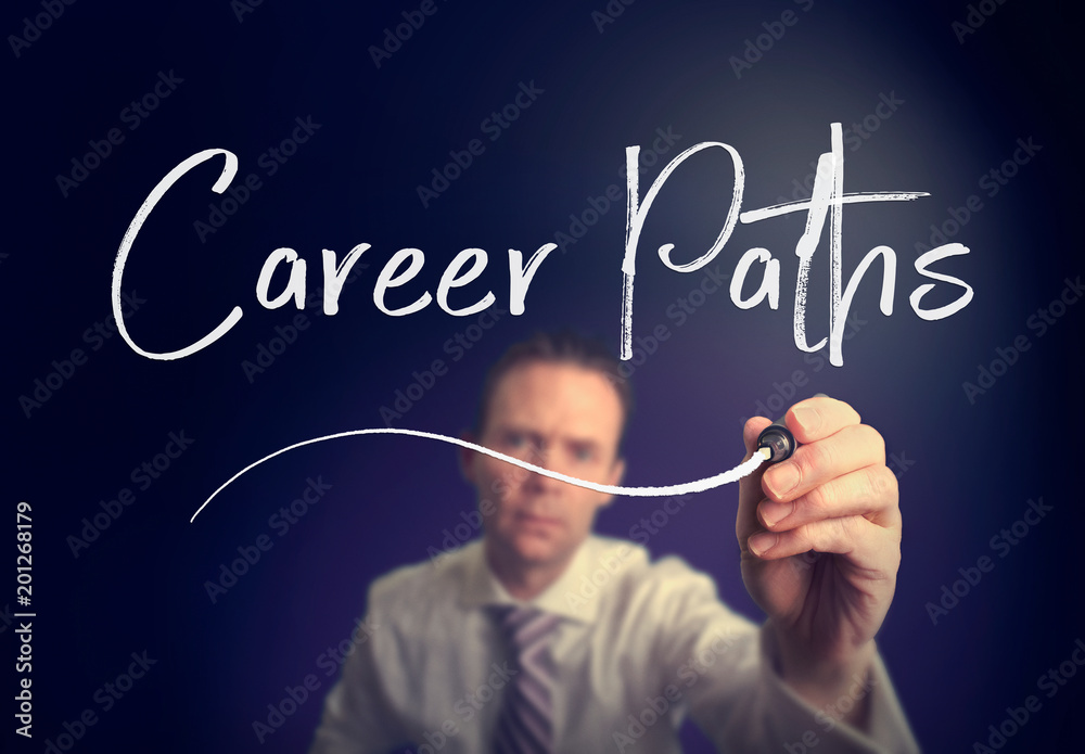 A businessman writing a Career Paths concept with a white pen on a clear screen. A businessman writing a Career Paths concept with a white pen on a clear screen.