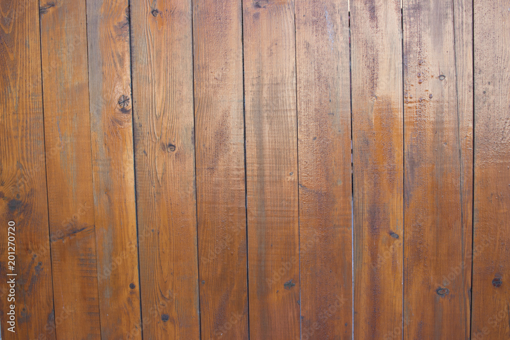 Dark brown vertical wood planks Dark brown vertical wood planks