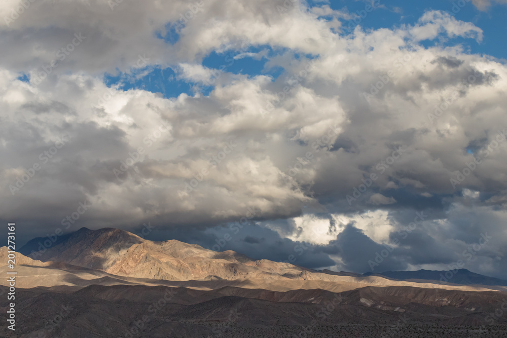 Cloudscape over mountain range at Death Valley National Park, California