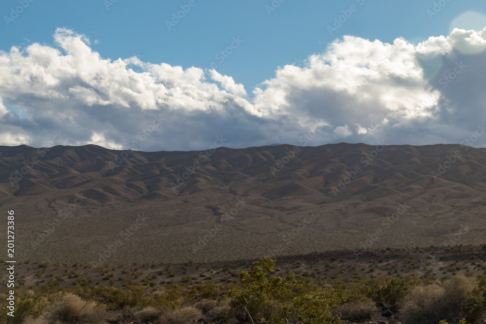 Cloudscape over mountain range at Death Valley National Park, California