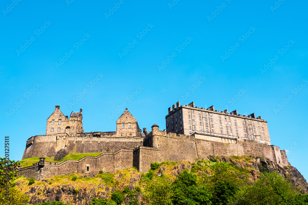 View of Edinburgh castle in Scotland, UK. Cloudy sky during the day