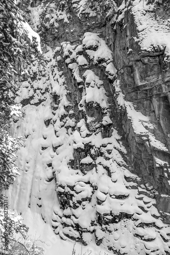 Snow covering a rock wall