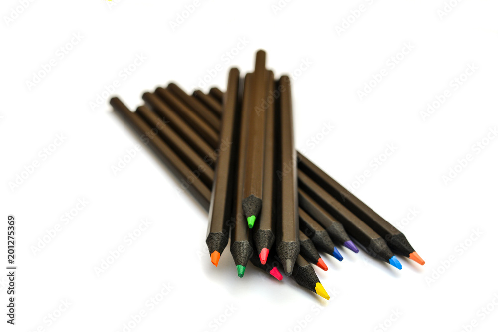 Obraz premium Collection of colorful pens over white background