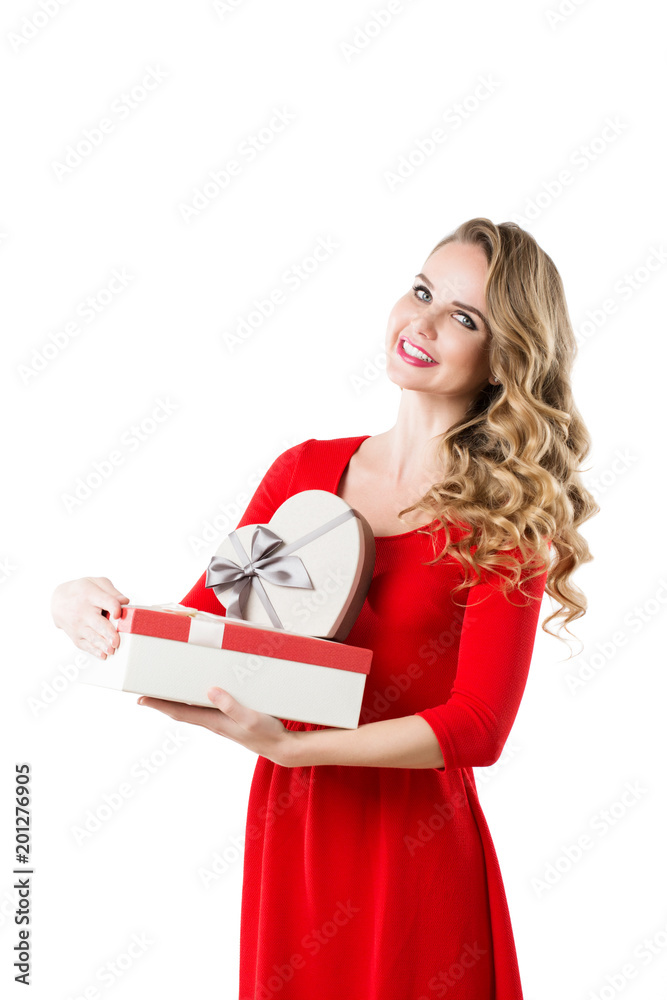 Beautiful smiling woman in a red dress with gifts isolated. Beautiful smiling woman in a red dress with gifts isolated.