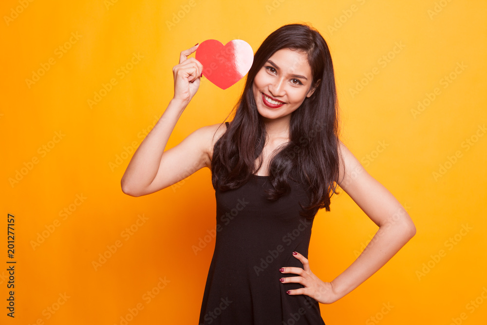 Asian woman with red heart. Asian woman with red heart.