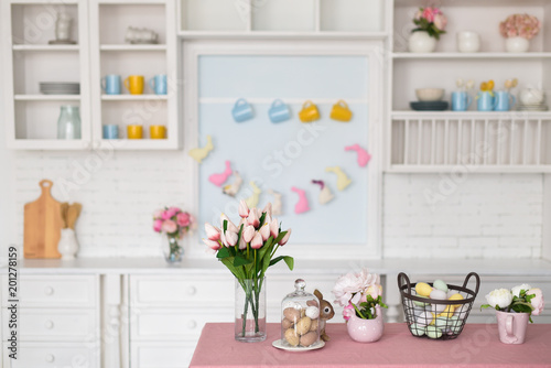 Kitchen interior with a vase of tulips