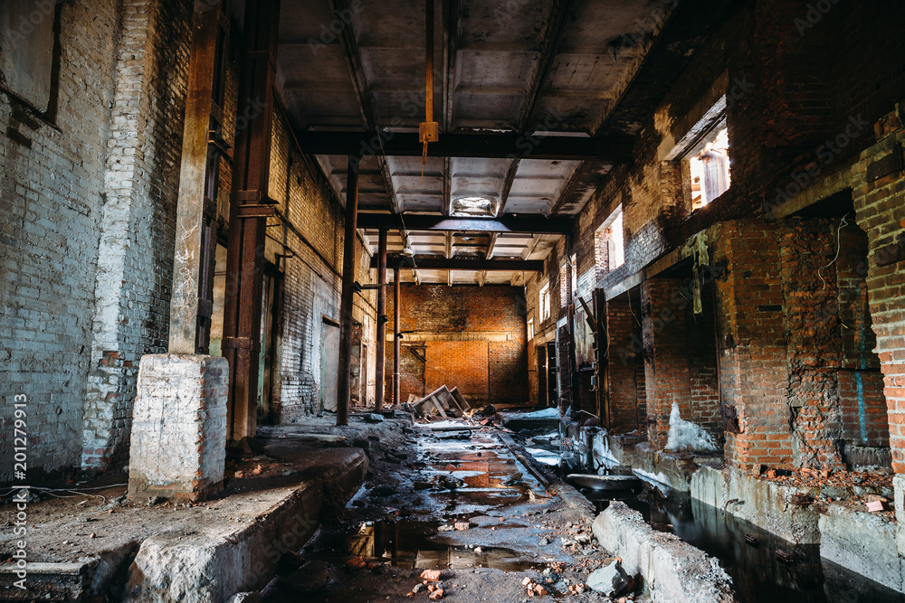 Abandoned ruined industrial factory building, corridor view with perspective, ruins and demolition concept Abandoned ruined industrial factory building, corridor view with perspective, ruins and demolition concept