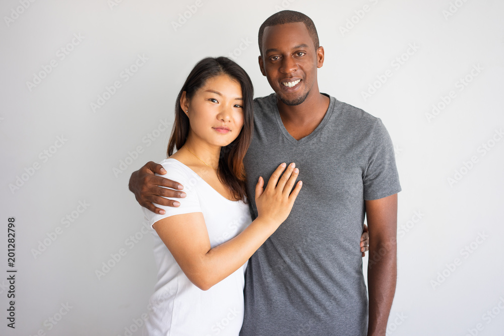 Smiling Young African Man Hugging His Asian Girlfriend Romantic Portrait Of Interracial Couple 